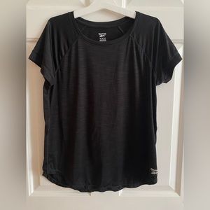 Women’s Reebok workout t-shirt in black. Size medium.